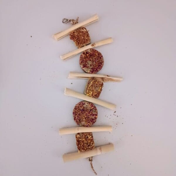 Hanging rabbit treats with calendula, timothy hay, rose, apple sticks and bamboo